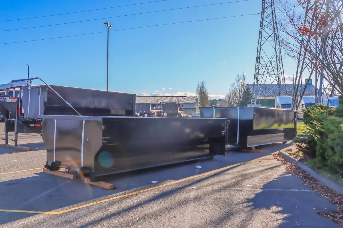 Roll-off dumpster ready for waste disposal at job site for Concrete Dumpster Rental in Fountainhead-Orchard Hills
